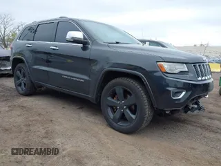 2014 Jeep Grand Cherokee Overland with VIN 1C4RJFCG6EC121654, listed as a IAAI auction lot 42051730 with 163,853 mi miles. Bid and sale history available at carsss.com. Image 1.