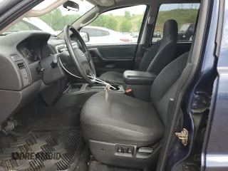 2004 Jeep Grand Cherokee Laredo with VIN 1J4GW48S04C125931, listed as a Copart auction lot 59972695 with 198,403 mi miles and Salvage title. Bid and sale history available at DreamBid. Image 7.
