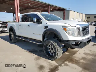 2016 Nissan Titan Platinum Reserve z VIN 1N6BA1F21GN513109, wystawiony jako Copart lot #64840434 z przebiegiem 94 263 mil mil oraz Czysty tytuł • Clean title. Historia ofert i sprzedaży dostępna na DreamBid. Obrazek 4.