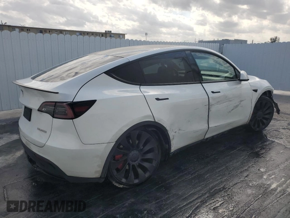 2023 Tesla Model Y Performance with VIN 7SAYGDEF8PF595178, listed as a Copart auction lot 46496995 with 39,057 mi miles and Non Repairable. Bid and sale history available at DreamBid. Image 3.