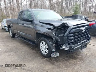 2023 Toyota Tundra with VIN 5TFKB5GDXPX002218, listed as a IAAI auction lot 41932719 with 71,335 mi miles and . Bid and sale history available at DreamBid. Image 1.