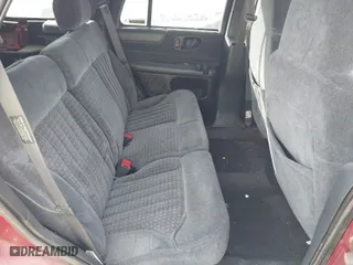 1999 Chevrolet Blazer LS with VIN 1GNDT13W9XK138608, listed as a IAAI auction lot 41531289 with 204,638 mi miles. Bid and sale history available at carsss.com. Image 8.