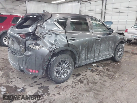 2020 Mazda CX-5 Touring with VIN JM3KFBCM0L0843242, listed as a IAAI auction lot 41536075 with 31,849 mi miles. Bid and sale history available at carsss.com. Image 4.