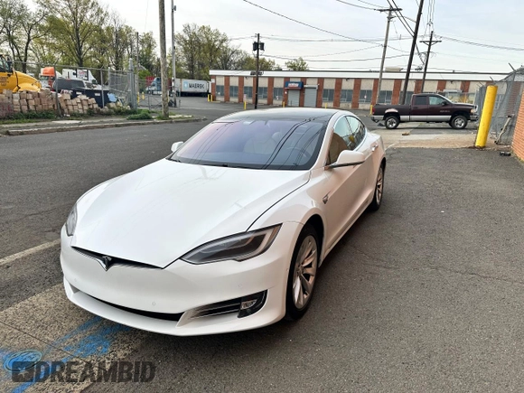 2019 Tesla Model S 75D with VIN 5YJSA1E28KF333962, listed as a Copart auction lot 54815975 with 21,203 mi miles and Salvage title. Bid and sale history available at DreamBid. Image 2.