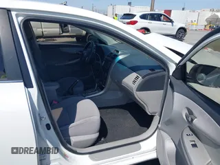 2013 Toyota Corolla L with VIN JTDBU4EE1DJ116557, listed as a IAAI auction lot 41981691 with 169,898 mi miles. Bid and sale history available at carsss.com. Image 5.