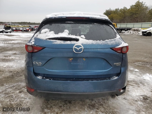 2021 Mazda CX-5 Grand Touring Reserve with VIN JM3KFBAY1M0313207, listed as a Copart auction lot 44812345 with 43,840 mi miles and Salvage Title. Bid and sale history available at carsss.com. Image 6.