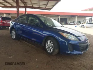 2012 Mazda 3 i Touring with VIN JM1BL1V82C1611229, listed as a IAAI auction lot 41809234 with 124,929 mi miles. Bid and sale history available at carsss.com. Image 1.