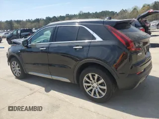 2021 Cadillac XT4 FWD Premium Luxury z VIN 1GYFZCR48MF002468, wystawiony jako Copart lot #50878955 z przebiegiem 76 034 mil mil oraz Szkoda całkowita • Salvage title. Historia ofert i sprzedaży dostępna na DreamBid. Obrazek 2.