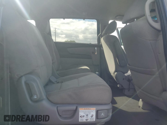 2015 Honda Odyssey LX with VIN 5FNRL5H27FB018491, listed as a Copart auction lot 54888445 with 129,488 mi miles and Salvage Title. Bid and sale history available at DreamBid. Image 11.