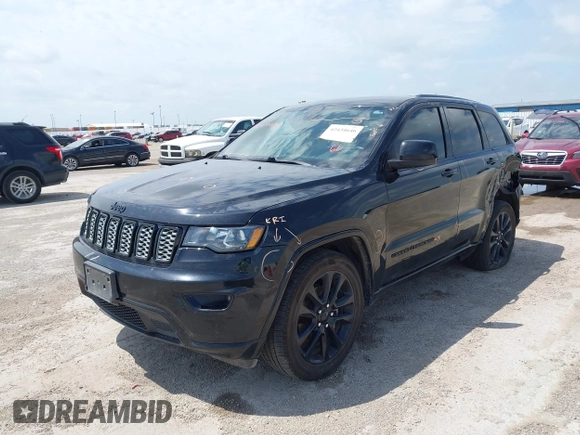 2019 Jeep Grand Cherokee Altitude with VIN 1C4RJEAG0KC857787, listed as a IAAI auction lot 42434646 with 193,968 mi miles and . Bid and sale history available at DreamBid. Image 2.
