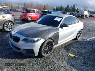 2015 BMW 2 Series 228i with VIN WBA1F5C55FV343662, listed as a IAAI auction lot 41729309 with 90,770 mi miles. Bid and sale history available at carsss.com. Image 18.