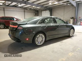 2015 Lincoln MKZ z VIN 3LN6L2J95FR613519, wystawiony jako Copart lot #59165895 z przebiegiem 117 630 mil mil oraz Szkoda całkowita • Salvage title. Historia ofert i sprzedaży dostępna na DreamBid. Obrazek 3.