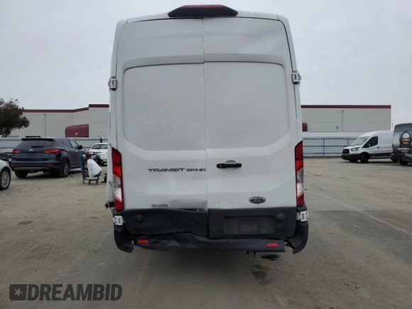 2020 Ford Transit Cargo with VIN 1FTBF4XG7LKB21098, listed as a Copart auction lot 44429335 with 163,011 mi miles and Salvage Title. Bid and sale history available at DreamBid. Image 6.