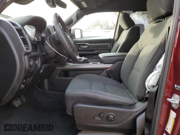 2022 Ram 1500 Big Horn with VIN 1C6SRFMT3NN265986, listed as a Copart auction lot 83177674 with 27,077 mi miles and Salvage title. Bid and sale history available at DreamBid. Image 7.