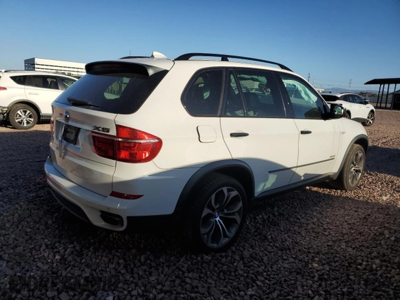 2013 BMW X5 xDrive50i with VIN 5UXZV8C55D0C16304, listed as a Copart auction lot 53406135 with 103,704 mi miles and Salvage title. Bid and sale history available at DreamBid. Image 3.