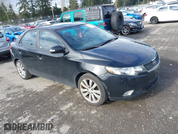 2010 Kia Forte SX with VIN KNAFW4A39A5054469, listed as a IAAI auction lot 41526636 with 115,008 mi miles. Bid and sale history available at carsss.com. Image 1.