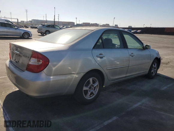 2003 Toyota Camry LE with VIN JTDBE32K930176303, listed as a Copart auction lot 52633565 with 168,231 mi miles and Salvage Title. Bid and sale history available at DreamBid. Image 3.