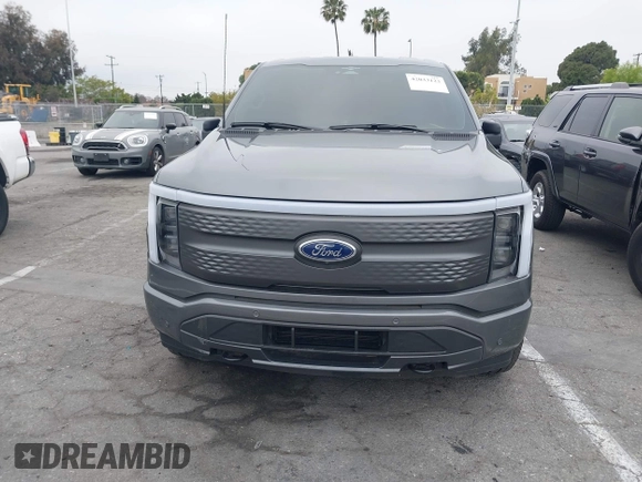 2023 Ford F-150 Lightning Pro with VIN 1FTVW1EL8PWG48559, listed as a IAAI auction lot 42033123 with 8,845 mi miles and . Bid and sale history available at DreamBid. Image 12.