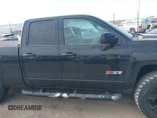 2016 Chevrolet Silverado 1500 LT with VIN 1GCVKREC2GZ345656, listed as a IAAI auction lot 41882885 with 145,820 mi miles. Bid and sale history available at carsss.com. Image 13.