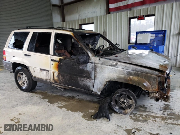 1998 Jeep Grand Cherokee Laredo with VIN 1J4GZ58S2WC222595, listed as a Copart auction lot 51108625 with 0 mi miles and Salvage Title. Bid and sale history available at carsss.com. Image 4.