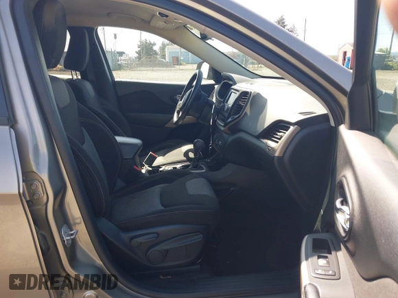 2017 Jeep Cherokee Sport with VIN 1C4PJMAB1HW584727, listed as a IAAI auction lot 42030824 with 147,527 mi miles and . Bid and sale history available at DreamBid. Image 5.