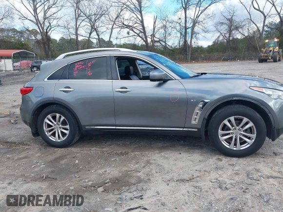 2015 Infiniti QX70 with VIN JN8CS1MWXFM480906, listed as a IAAI auction lot 41177811 with 176,527 mi miles and . Bid and sale history available at DreamBid. Image 13.