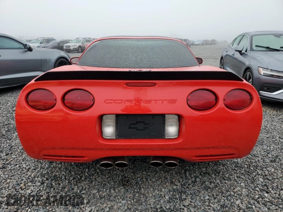 2000 Chevrolet Corvette with VIN 1G1YY22G3Y5115717, listed as a Copart auction lot 85612884 with 115,117 mi miles and Salvage Title. Bid and sale history available at carsss.com. Image 6.
