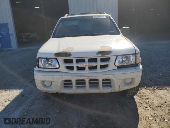 2001 Isuzu Rodeo S with VIN 4S2CK58W514310849, listed as a Copart auction lot 89221945 with 138,720 mi miles and Salvage title. Bid and sale history available at DreamBid. Image 5.