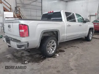 2015 GMC Sierra 1500 SLT with VIN 3GTU2VEC1FG519042, listed as a IAAI auction lot 41629031 with 163,856 mi miles and . Bid and sale history available at DreamBid. Image 4.