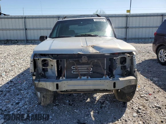 1997 Jeep Grand Cherokee Laredo with VIN 1J4GZ58S5VC561060, listed as a Copart auction lot 52098315 with 267,245 mi miles and Salvage title. Bid and sale history available at DreamBid. Image 5.