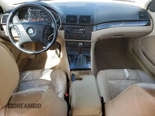2004 BMW 3 Series 325xi with VIN WBAEU33404PR08565, listed as a Copart auction lot 57865215 with 253,784 mi miles and Salvage title. Bid and sale history available at DreamBid. Image 8.