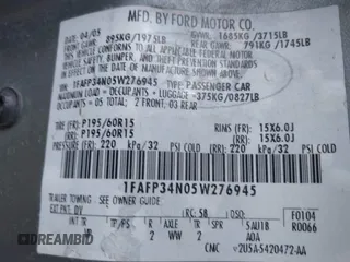 2005 Ford Focus S with VIN 1FAFP34N05W276945, listed as a IAAI auction lot 41889586 with 253,219 mi miles. Bid and sale history available at carsss.com. Image 9.