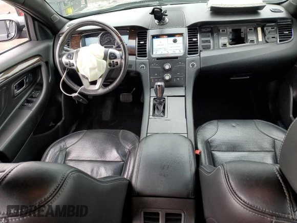 2016 Ford Taurus Limited with VIN 1FAHP2F81GG113129, listed as a Copart auction lot 55770045 with 104,778 mi miles and Salvage title. Bid and sale history available at DreamBid. Image 8.