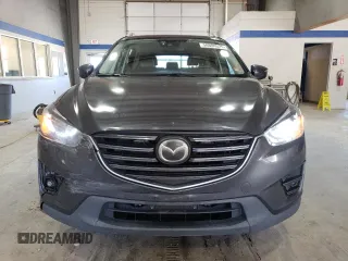 2016 Mazda CX-5 Grand Touring with VIN JM3KE4DY8G0616421, listed as a Copart auction lot 50884525 with 182,048 mi miles and Salvage Title. Bid and sale history available at DreamBid. Image 5.