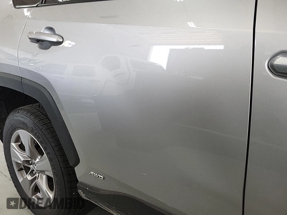 2023 Toyota RAV4 Hybrid XLE with VIN 2T3RWRFV9PW175446, listed as a IAAI auction lot 42806880 with 90,261 mi miles and . Bid and sale history available at DreamBid. Image 10.