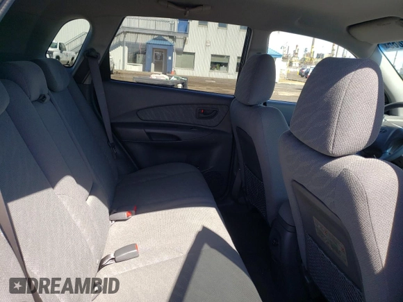 2005 Hyundai Tucson GL with VIN KM8JM72D55U167063, listed as a Copart auction lot 52002865 with 157,945 mi miles and Salvage Title. Bid and sale history available at carsss.com. Image 10.