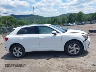 2020 Audi Q3 Premium z VIN WA1AECF39L1010852, wystawiony jako IAAI lot #39768583 z przebiegiem 100 414 mil mil oraz . Historia ofert i sprzedaży dostępna na DreamBid. Obrazek 13.