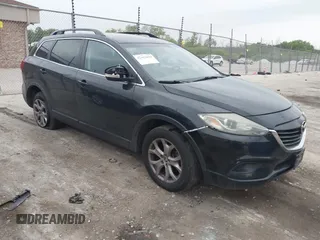 2014 Mazda CX-9 Sport z VIN JM3TB3BV8E0437180, wystawiony jako IAAI lot #42413844 z przebiegiem 177 393 mil mil oraz . Historia ofert i sprzedaży dostępna na DreamBid. Obrazek 1.