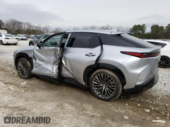 2023 Lexus RZ 450e Premium z VIN JTJAAAAB7PA005835, wystawiony jako Copart lot #42201414 z przebiegiem 2 144 mil mil oraz . Historia ofert i sprzedaży dostępna na DreamBid. Obrazek 2.