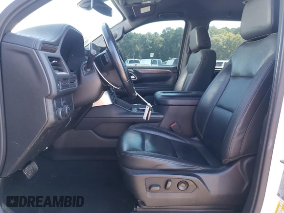 2021 Chevrolet Tahoe LT with VIN 1GNSCNKD4MR252131, listed as a Copart auction lot 69876114 with 99,192 mi miles and Salvage title. Bid and sale history available at DreamBid. Image 7.