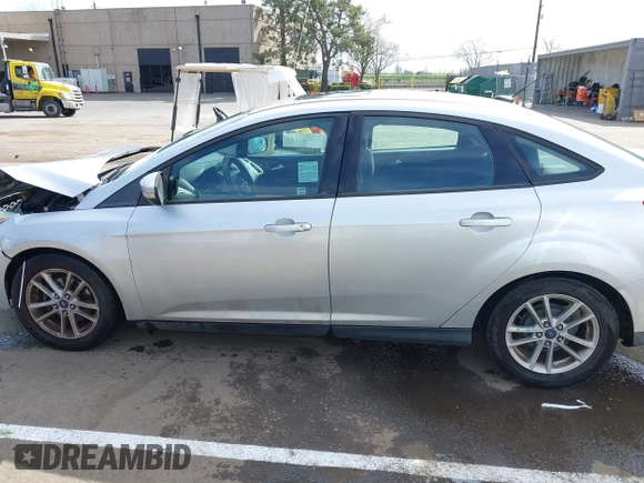 2015 Ford Focus SE with VIN 1FADP3F24FL203509, listed as a IAAI auction lot 41765582 with 139,856 mi miles. Bid and sale history available at carsss.com. Image 14.