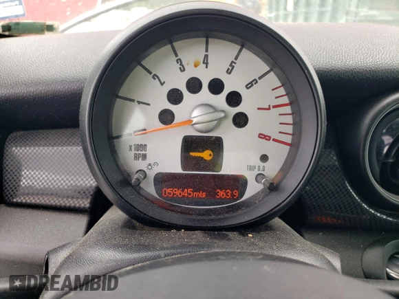 2013 MINI Hardtop S with VIN WMWSV3C58DT389460, listed as a Copart auction lot 54031105 with 59,645 mi miles and Salvage Title. Bid and sale history available at DreamBid. Image 9.