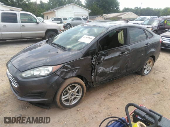 2018 Ford Fiesta SE z VIN 3FADP4BJ6JM126135, wystawiony jako IAAI lot #42503766 z przebiegiem 14 836 mil mil oraz . Historia ofert i sprzedaży dostępna na DreamBid. Obrazek 2.