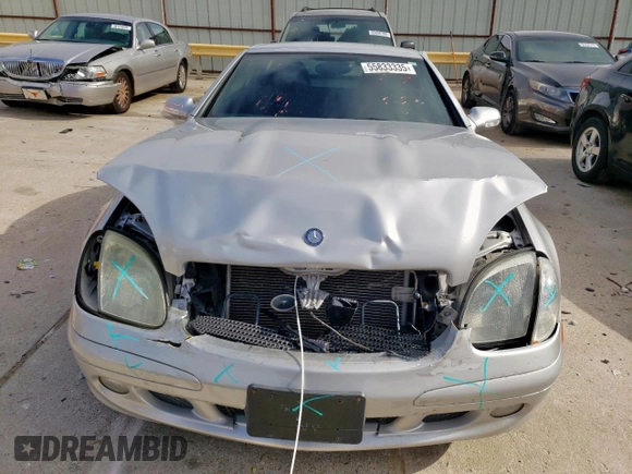 2003 Mercedes-Benz SLK 320 with VIN WDBKK65F73F284794, listed as a Copart auction lot 55833335 with 90,033 mi miles and Salvage title. Bid and sale history available at DreamBid. Image 5.
