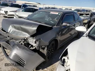 2012 Scion tC z VIN JTKJF5C71C3040608, wystawiony jako Copart lot #53704565 z przebiegiem Nie podano mil oraz Szkoda całkowita • Salvage title. Historia ofert i sprzedaży dostępna na DreamBid. Obrazek 1.