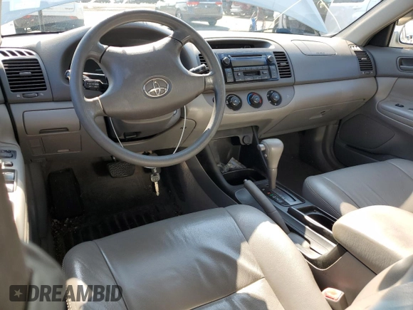 2004 Toyota Camry LE z VIN JTDBE32K640270298, wystawiony jako Copart lot #58800955 z przebiegiem 79 064 mil mil oraz Szkoda całkowita • Salvage title. Historia ofert i sprzedaży dostępna na DreamBid. Obrazek 8.