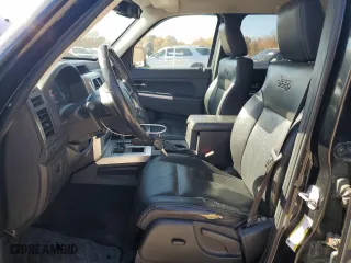 2009 Jeep Liberty Limited with VIN 1J8GN58K79W552651, listed as a Copart auction lot 77890874 with 140,342 mi miles and Salvage Title. Bid and sale history available at carsss.com. Image 7.
