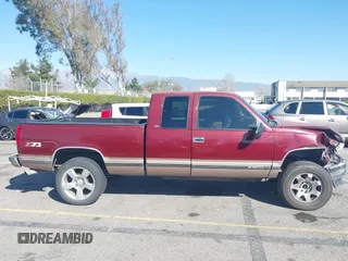 1997 Chevrolet Silverado 1500 with VIN 1GCEK19R4VE261195, listed as a IAAI auction lot 41637380 with 221,662 mi miles and . Bid and sale history available at DreamBid. Image 13.