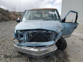 1989 GMC Safari z VIN 1GKDM15Z4KB517560, wystawiony jako Copart lot #51775615 z przebiegiem 152 882 mil mil oraz Szkody całkowita. Historia ofert i sprzedaży dostępna na DreamBid. Obrazek 5.