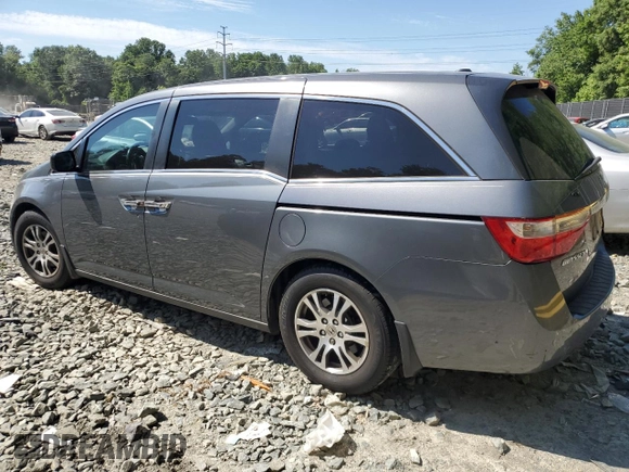 2012 Honda Odyssey EX-L with VIN 5FNRL5H69CB019771, listed as a Copart auction lot 59333624 with 197,203 mi miles and Salvage Title. Bid and sale history available at carsss.com. Image 2.